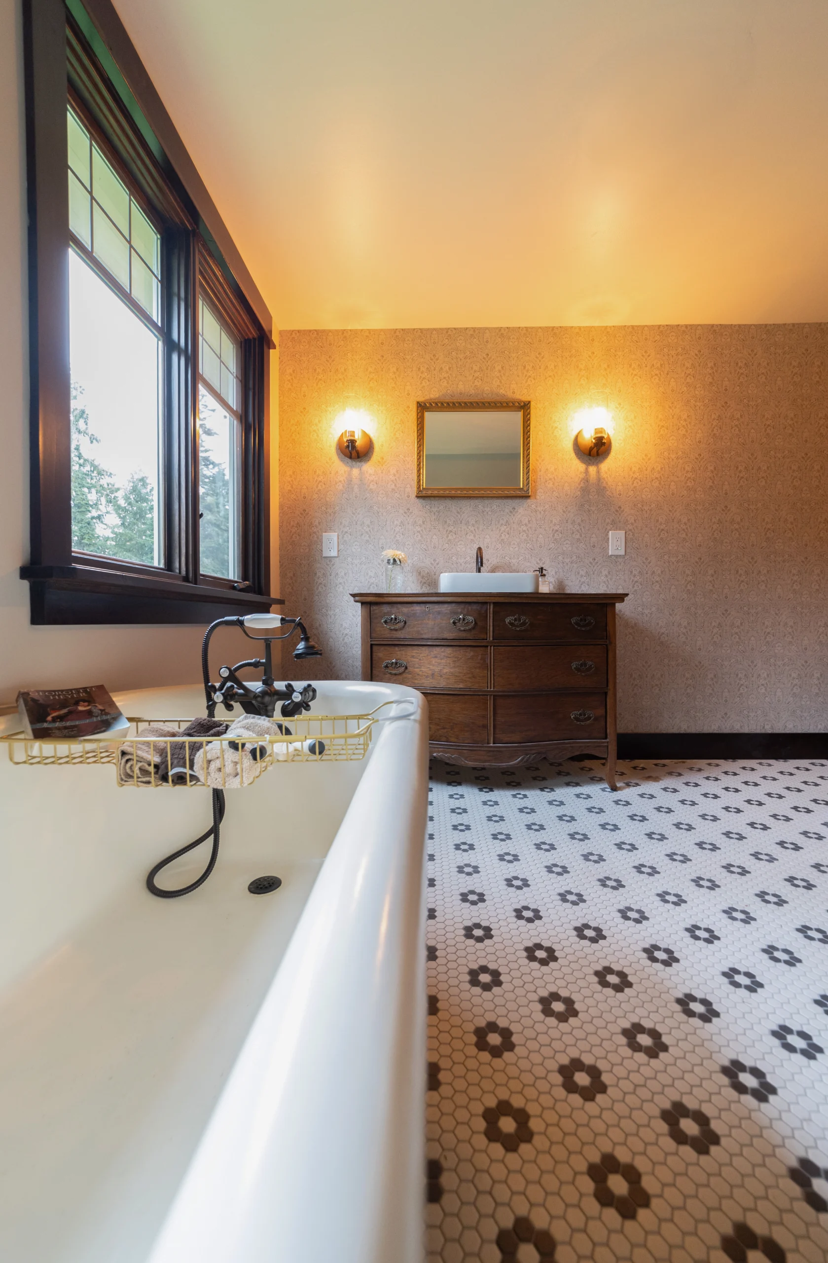 Old Fashioned Bathroom Remodel With Vintage Standing Tub & Wood Vanity With Small Mirror & Double Wall Lighting