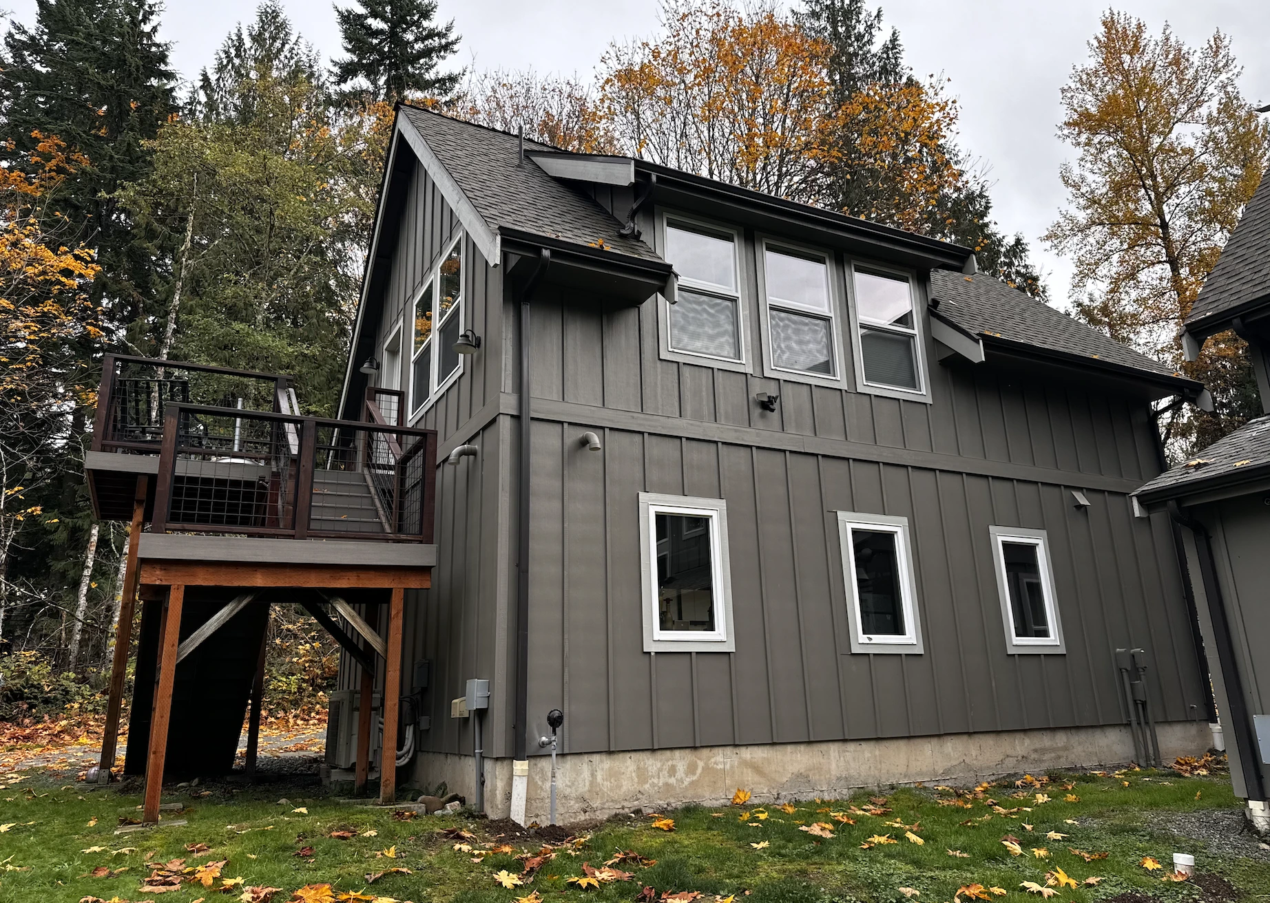 Completed NEw Home Build With Grey Siding & Grey Roof