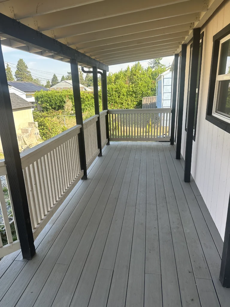 Wood Deck With White Fencing